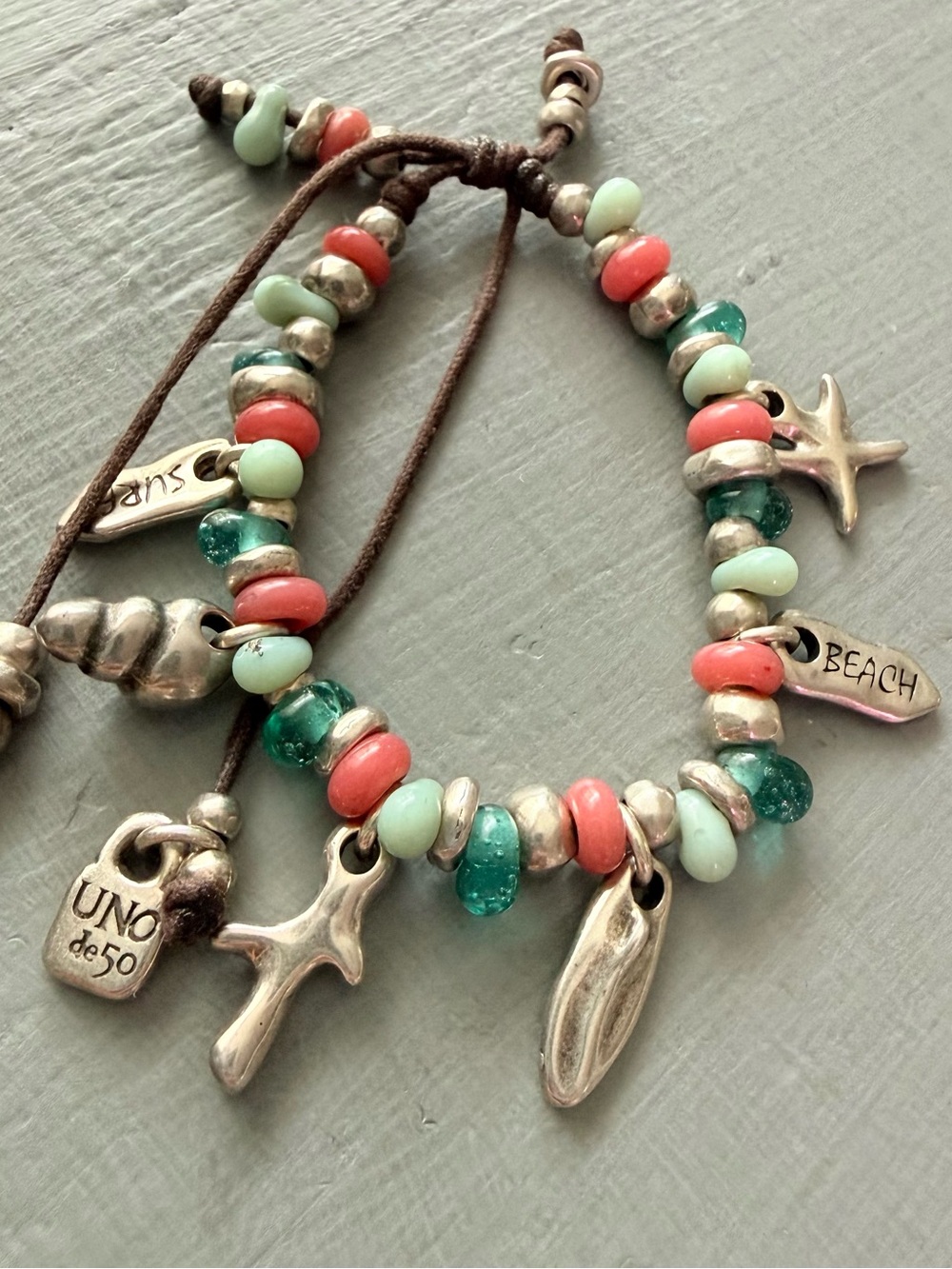 UNO de 50 Coral, Mint & Teal Beaded Charm Bracelet with Beach Charms